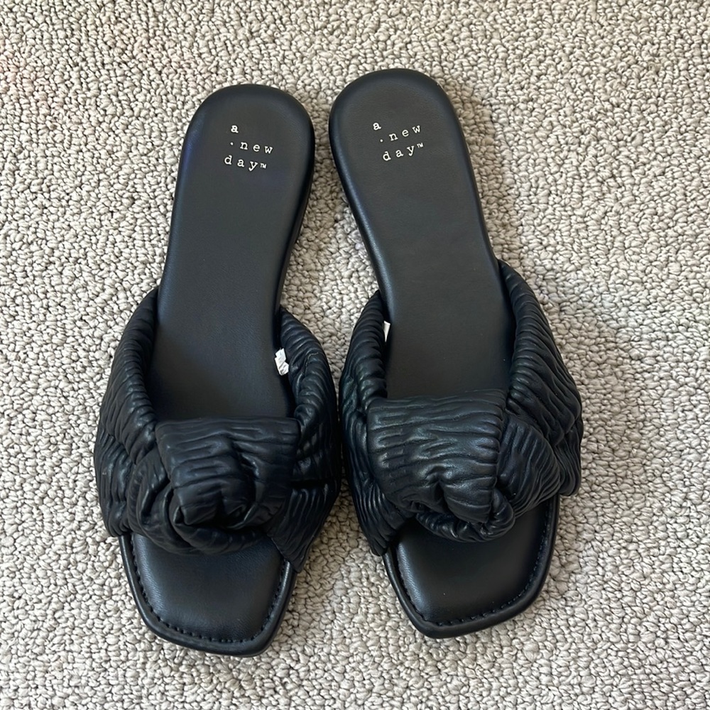 Black faux leather sandals